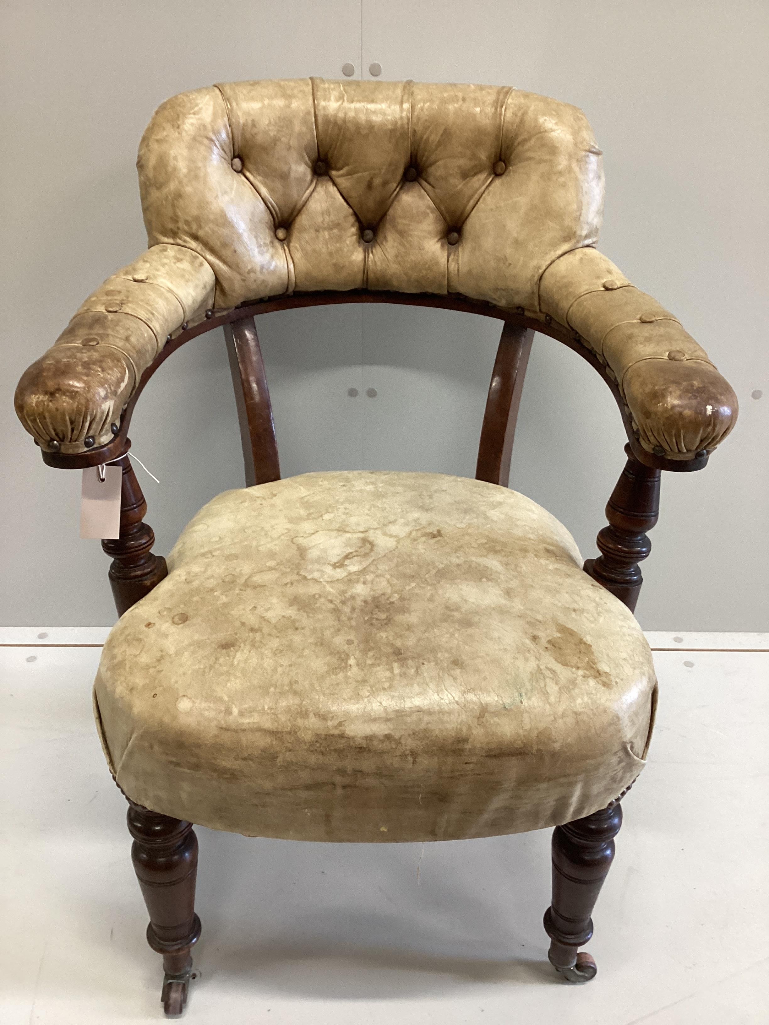 A late Victorian mahogany and buttoned leather tub frame desk chair, width 62cm, depth 50cm, height 90cm